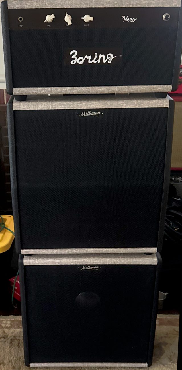 A Zoring Nero head on a Milkman 4x8 and a Milkman 1x15 cabinet